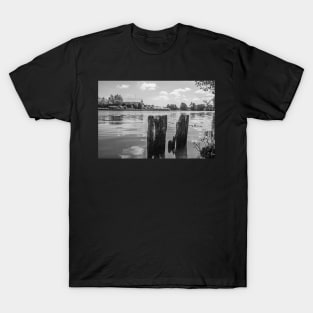 Wooden mooring posts on the River Bure in Horning, Norfolk T-Shirt